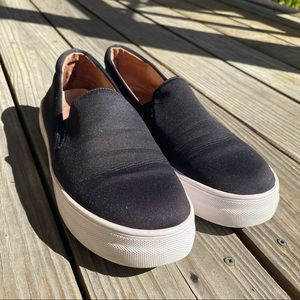 Like new black slip on sneakers